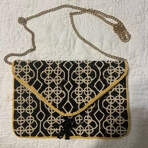 Black and cream glass beaded clutch with gold chain